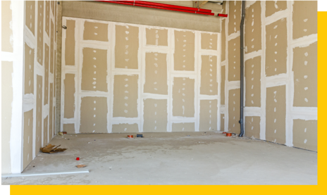 empty room with prepped plasterboard walls