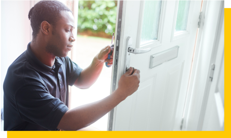 locksmith installing new front door lock